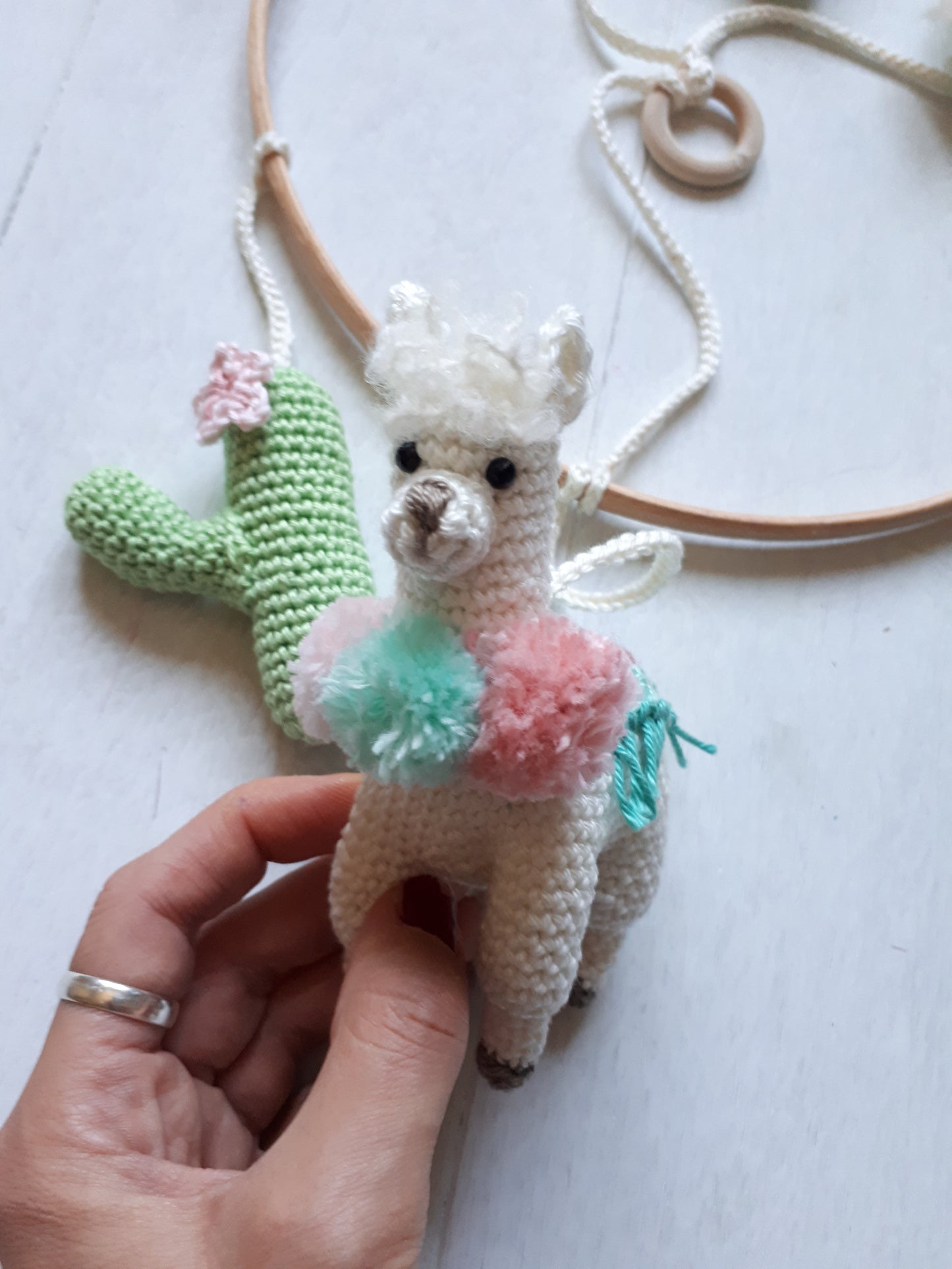 Llama and cactus baby mobile