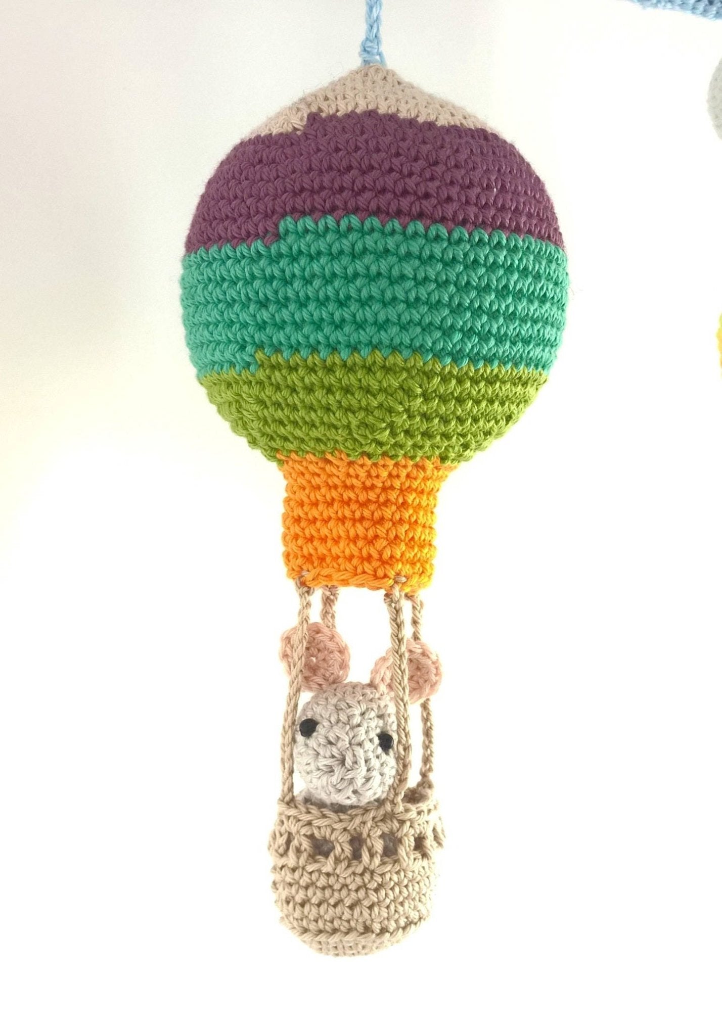 Colorful striped hot air balloon baby mobile - Crochet on a tree