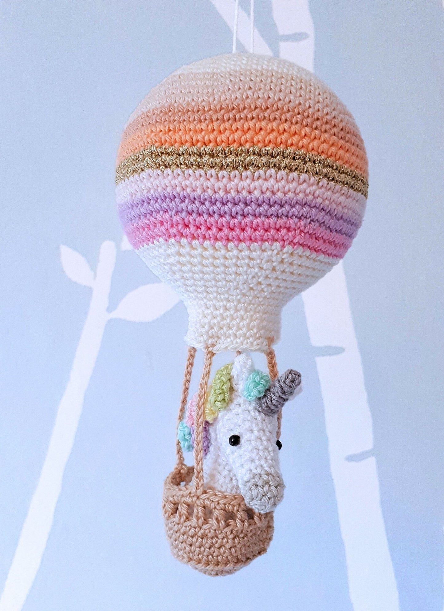 Crochet pattern amigurumi unicorn in a hot air balloon - Crochet on a tree