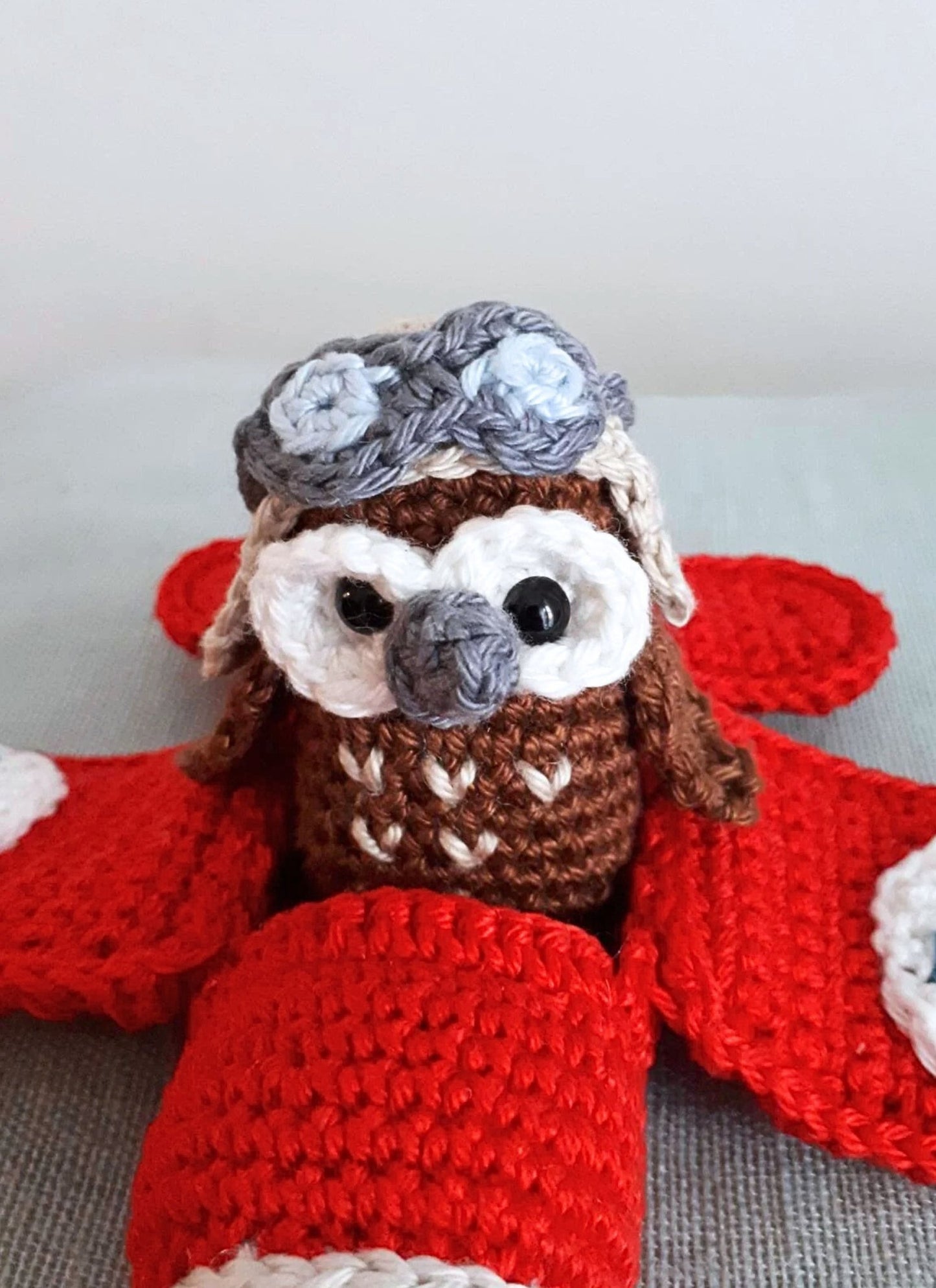 Red airplane with owl stuffed toy - Crochet on a tree