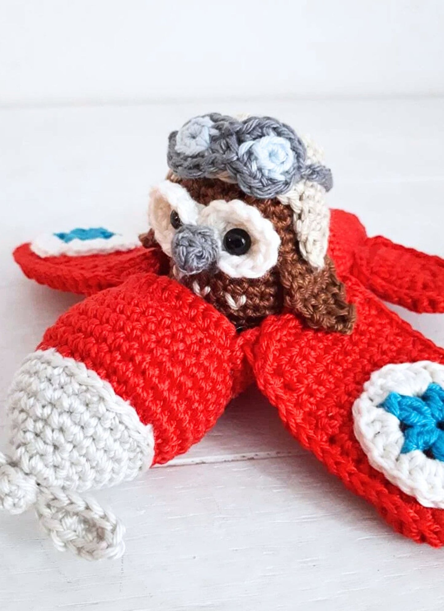 Red airplane with owl stuffed toy - Crochet on a tree