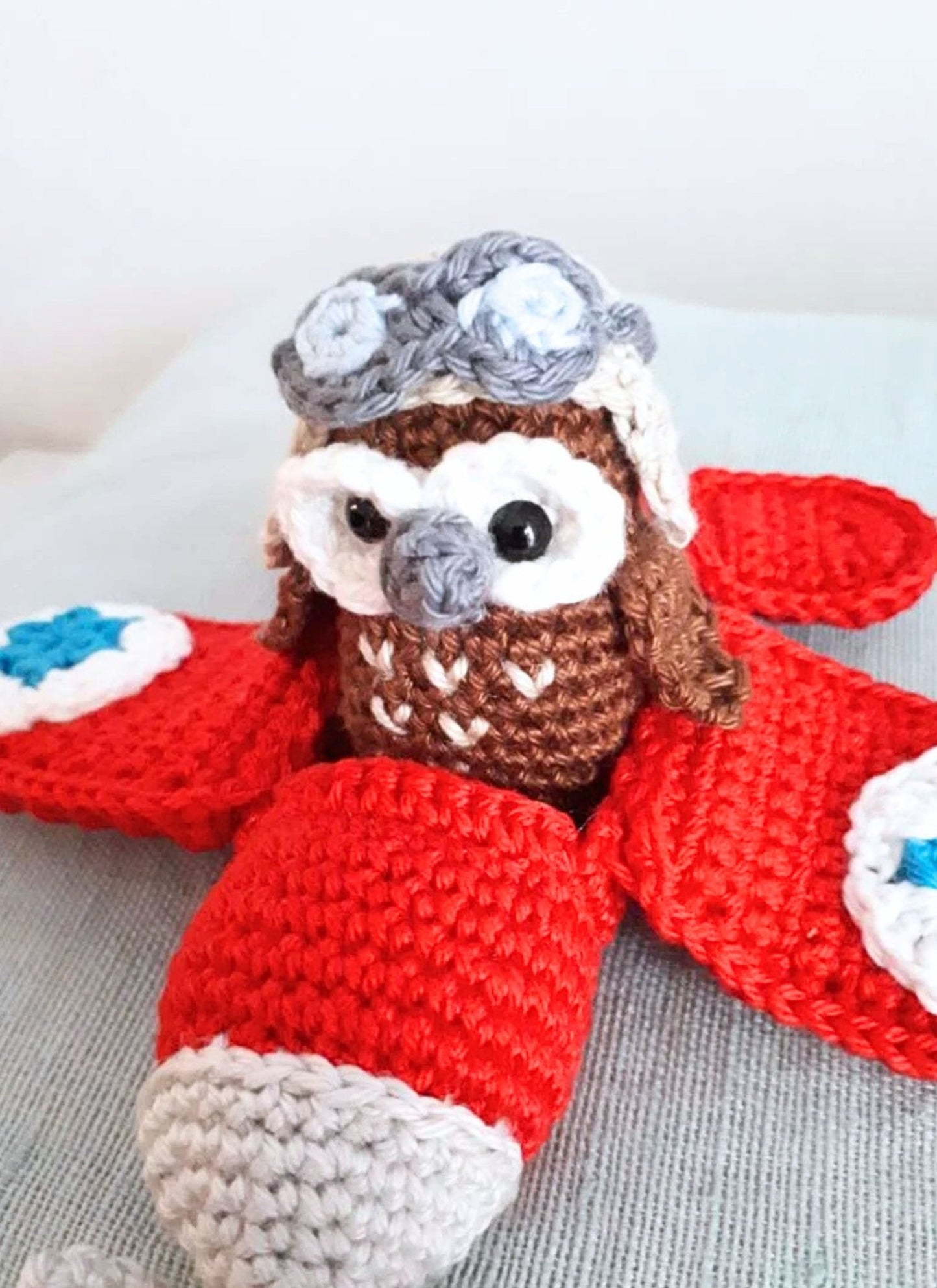 Red airplane with owl stuffed toy - Crochet on a tree