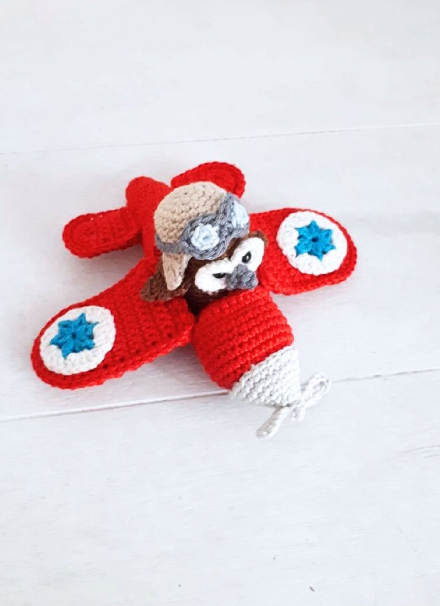 Red airplane with owl stuffed toy - Crochet on a tree