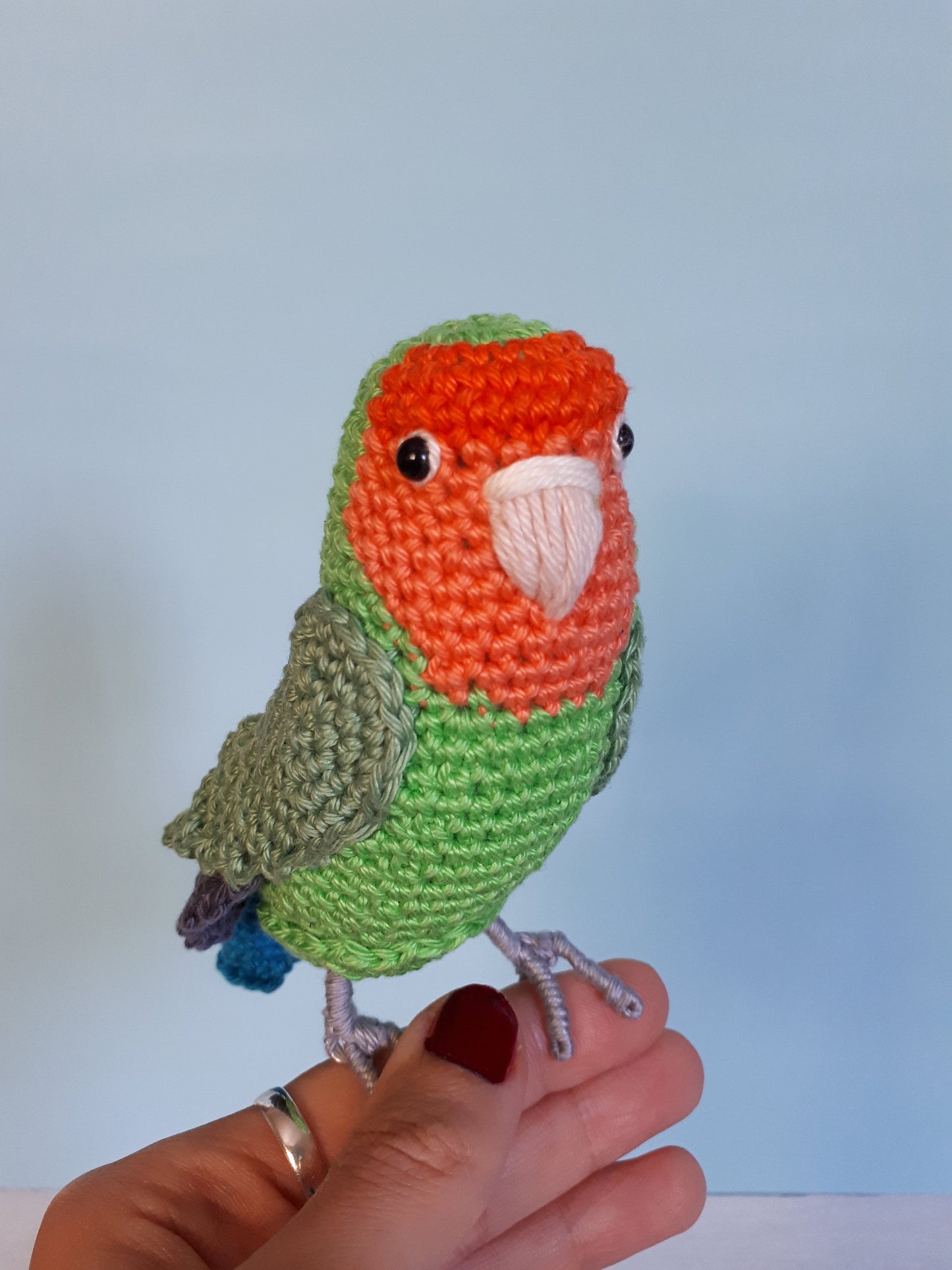 Crochet Peach-faced lovebird plush toy