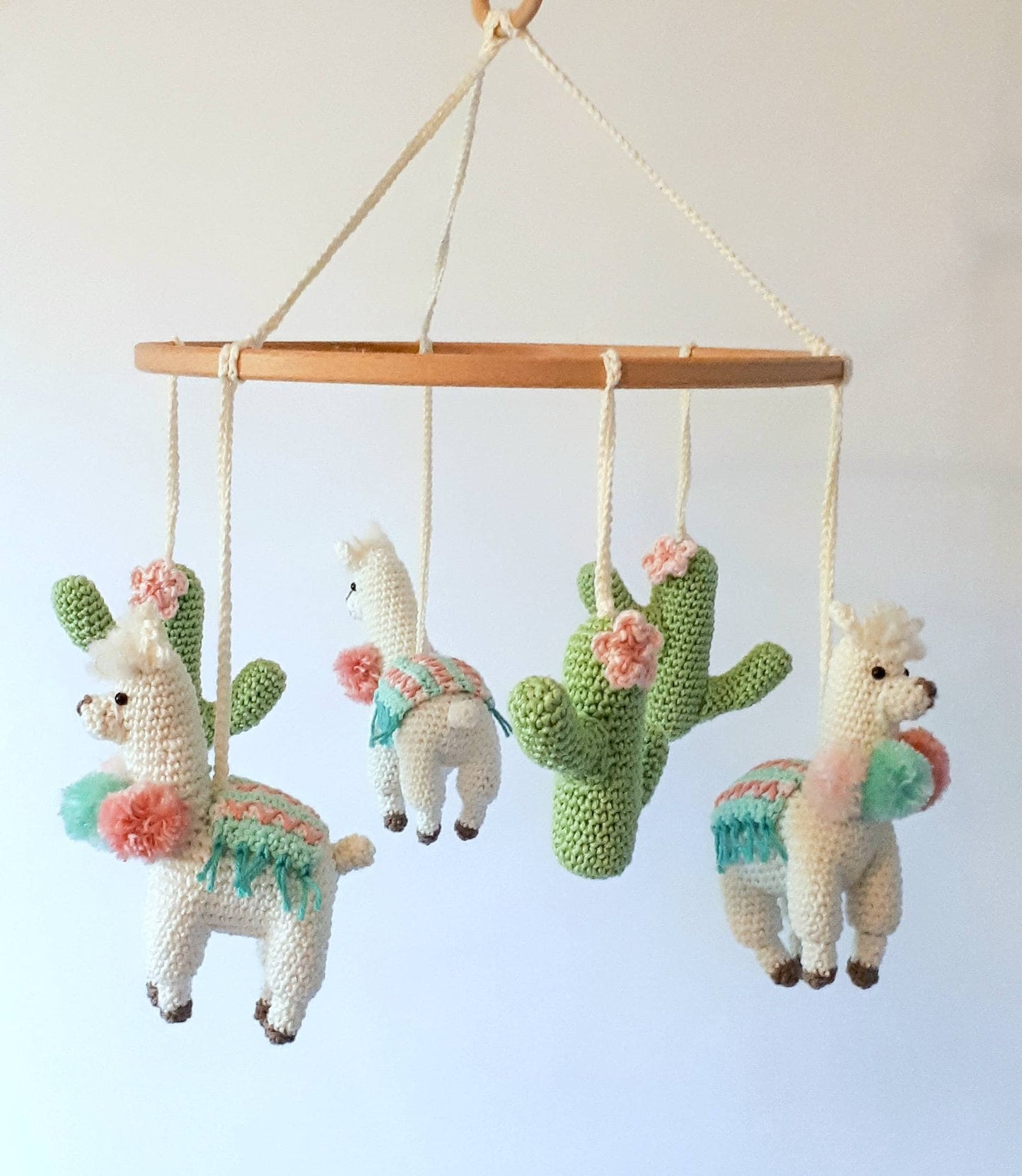 Llama and cactus baby mobile