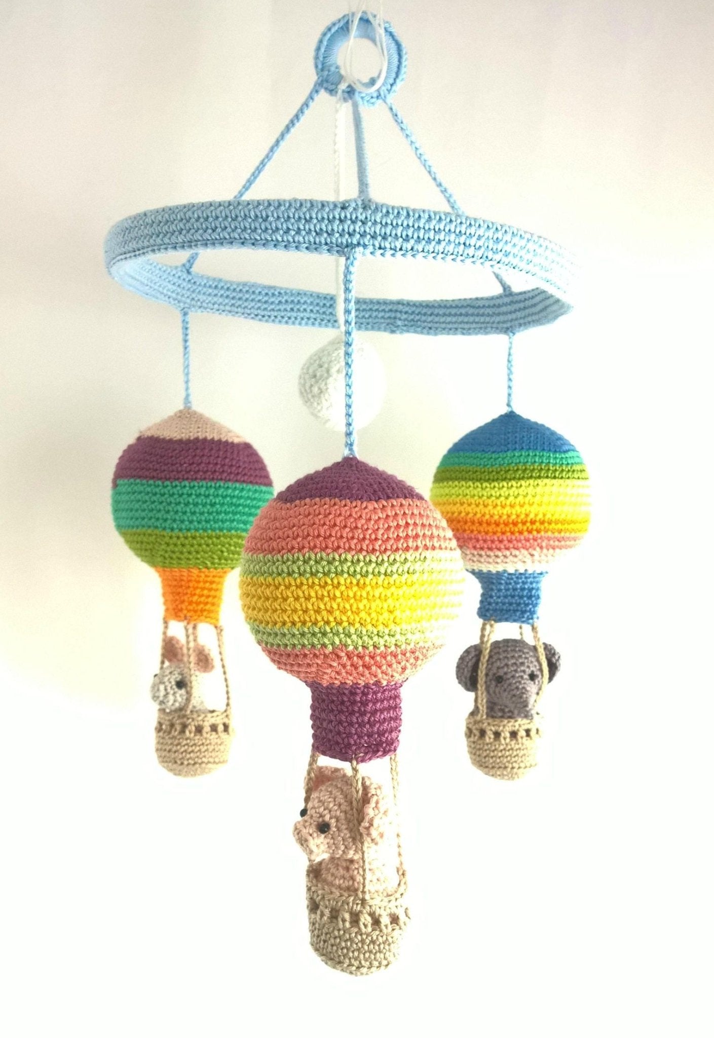 Colorful striped hot air balloon baby mobile - Crochet on a tree