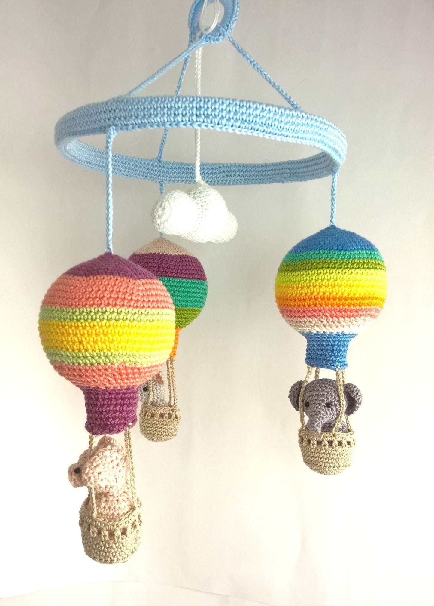 Colorful striped hot air balloon baby mobile - Crochet on a tree