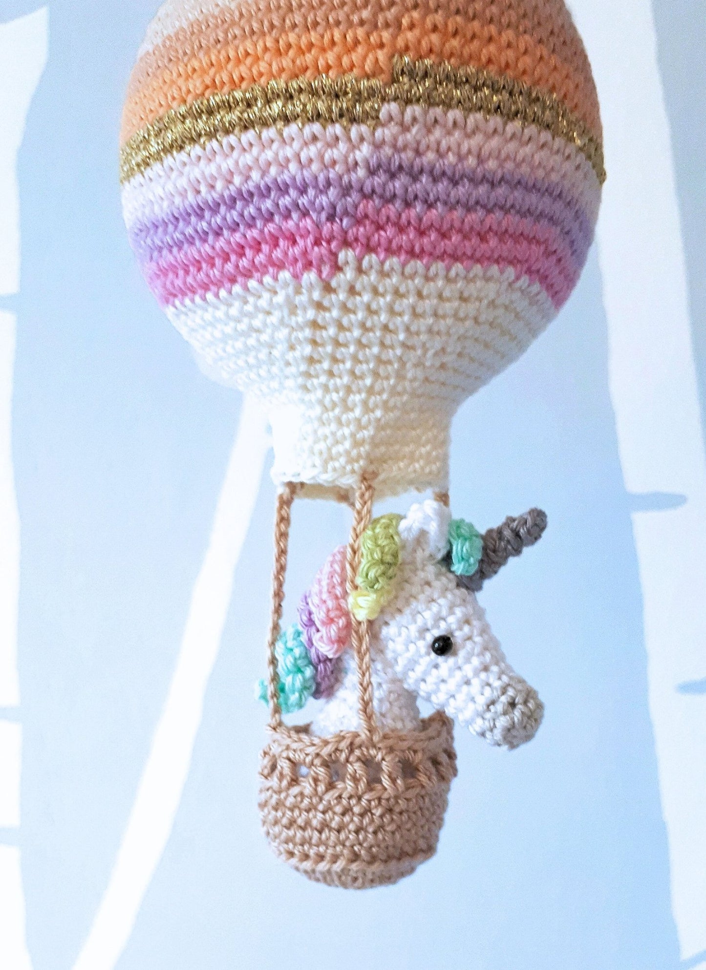 Crochet pattern amigurumi unicorn in a hot air balloon - Crochet on a tree