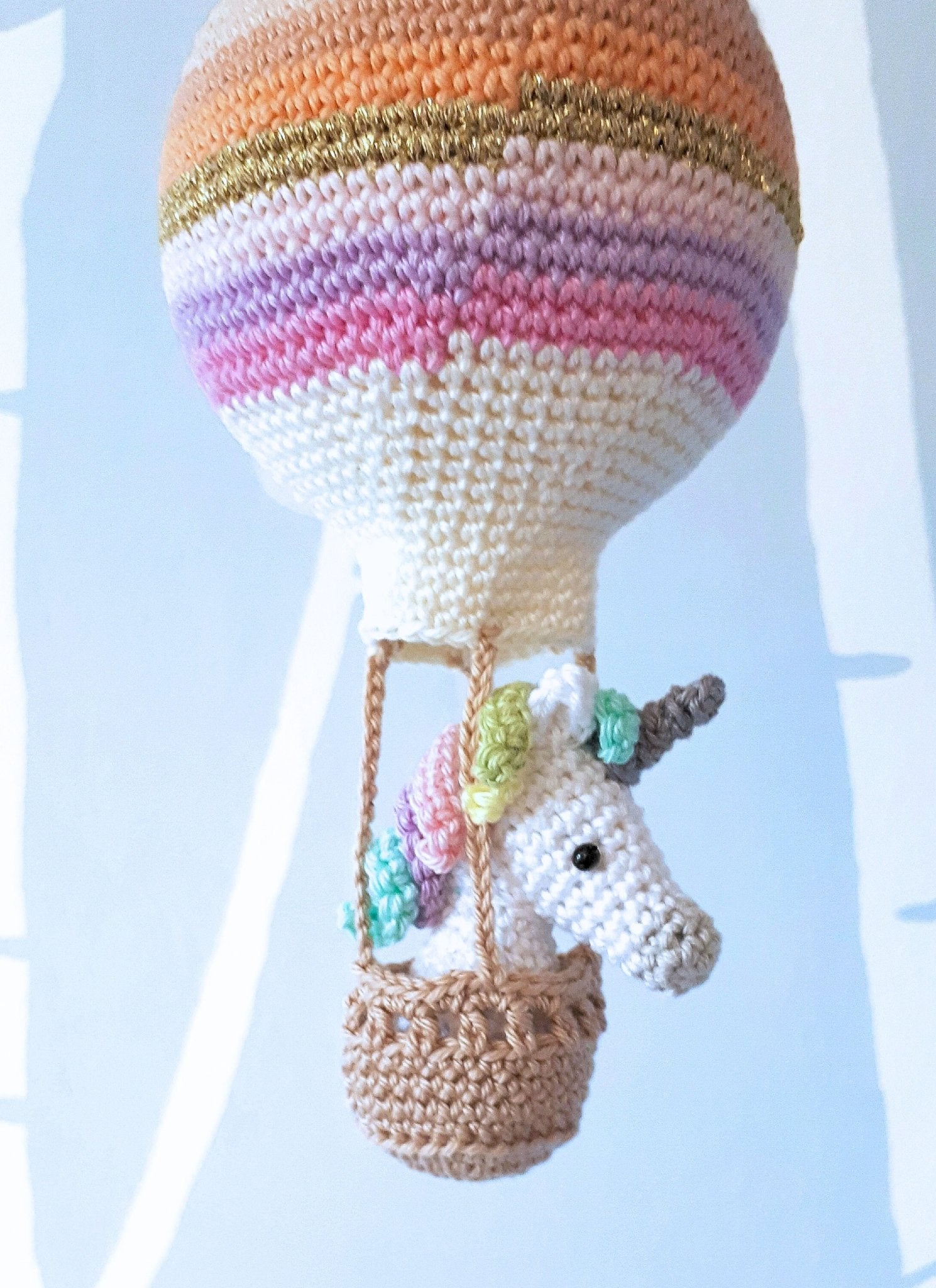 Crochet pattern amigurumi unicorn in a hot air balloon - Crochet on a tree