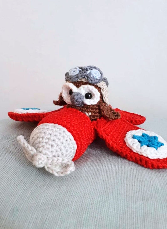 Red airplane with owl stuffed toy - Crochet on a tree