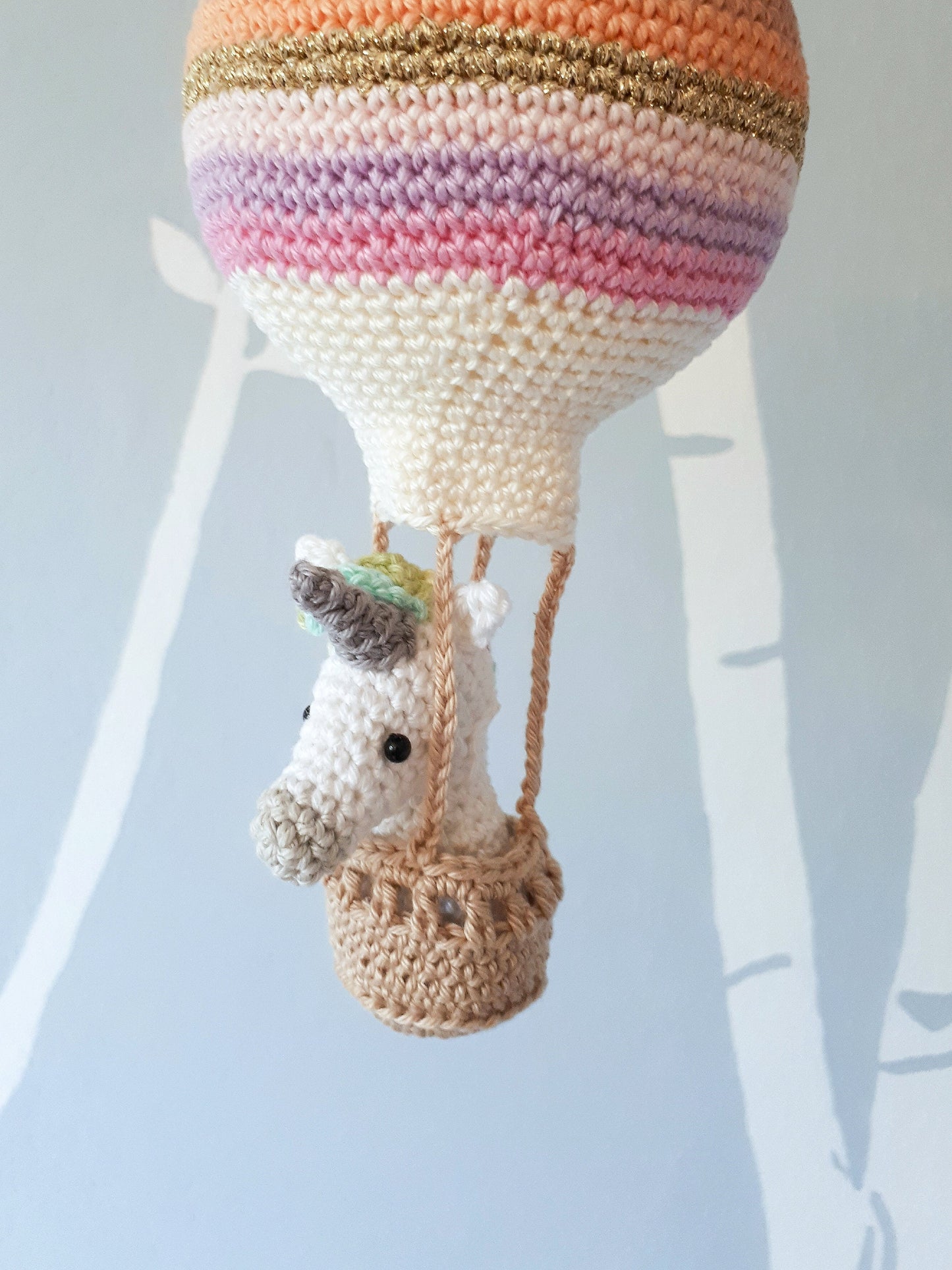 Crochet pattern amigurumi unicorn in a hot air balloon