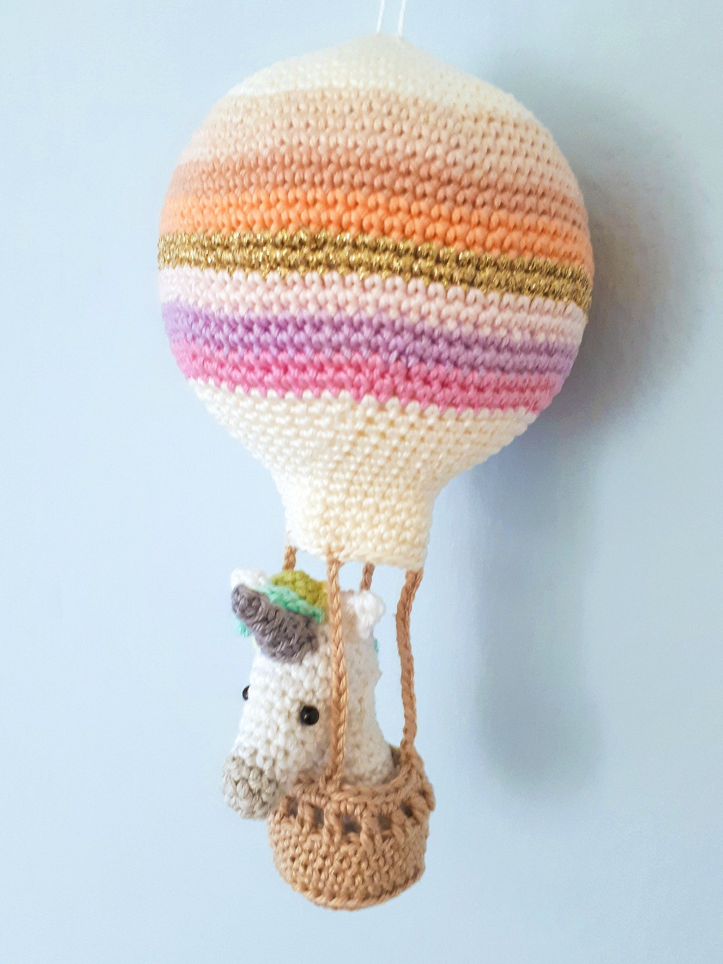 Unicorn in a hot air balloon, crochet nursery decoration
