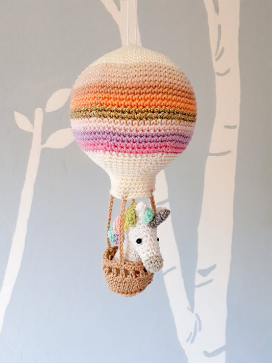 Unicorn in a hot air balloon, crochet nursery decoration