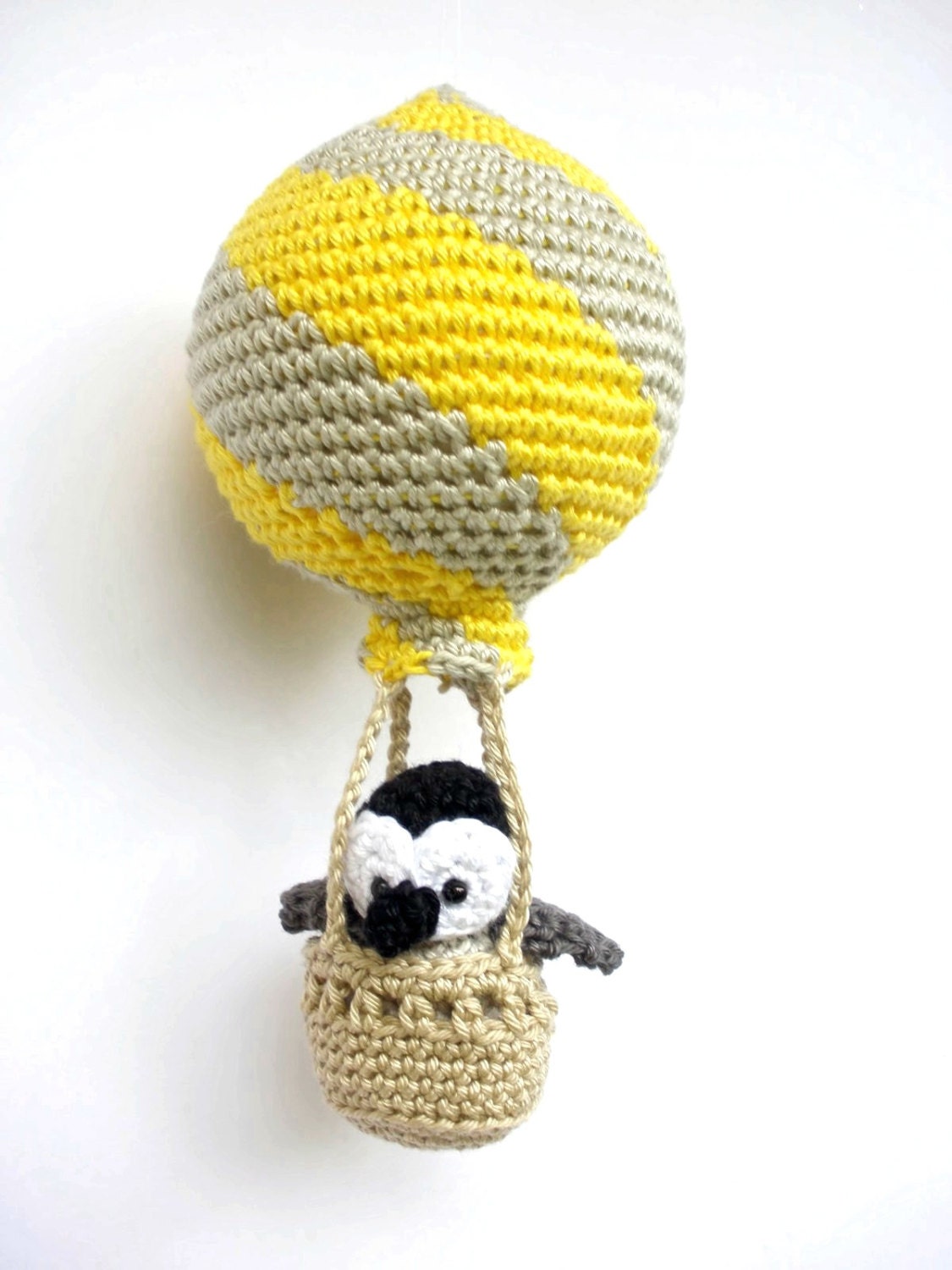 Penguin in a yellow hot air balloon nursery decoration